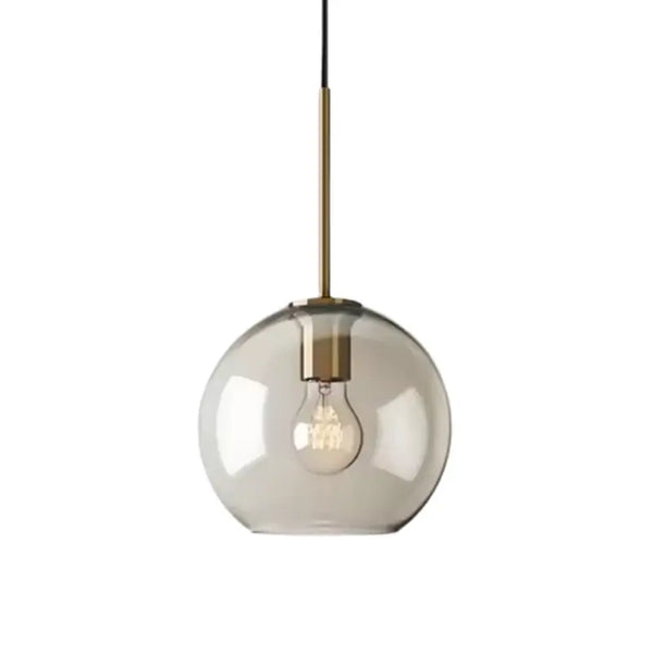 Luminária Pendente Vidro Ambaris Lumen, com globo fumê e detalhes em bronze dourado, sobre fundo branco