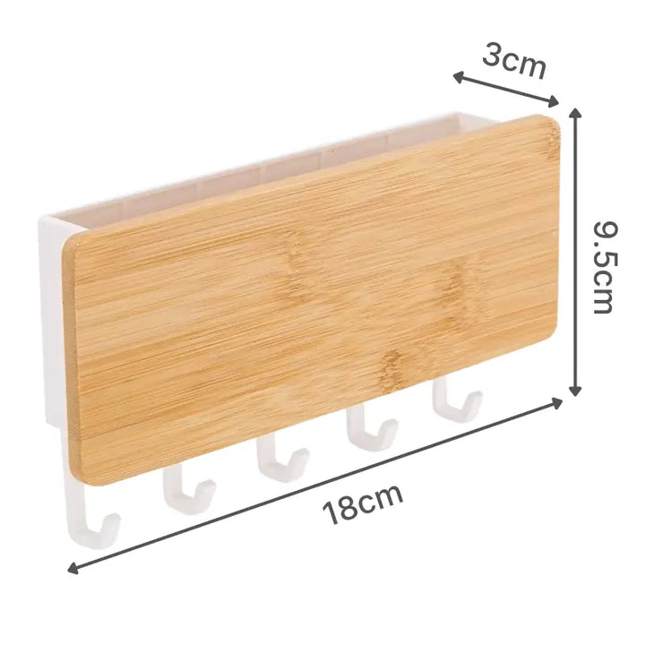 Dimensões do porta chaves Orto: 18cm largura x 9,5cm altura x 3cm profundidade com 5 ganchos brancos