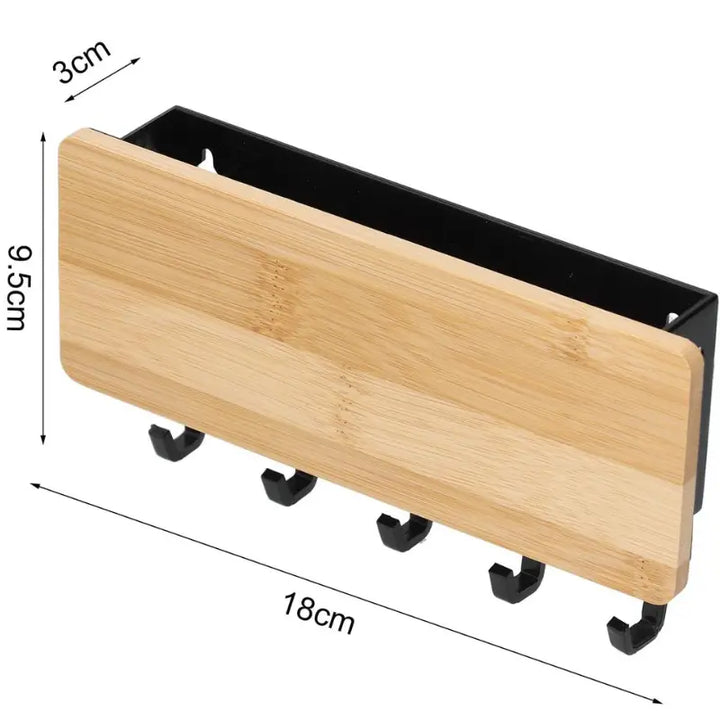 Dimensões do porta chaves Orto: 18cm largura x 9,5cm altura x 3cm profundidade com 5 ganchos pretos