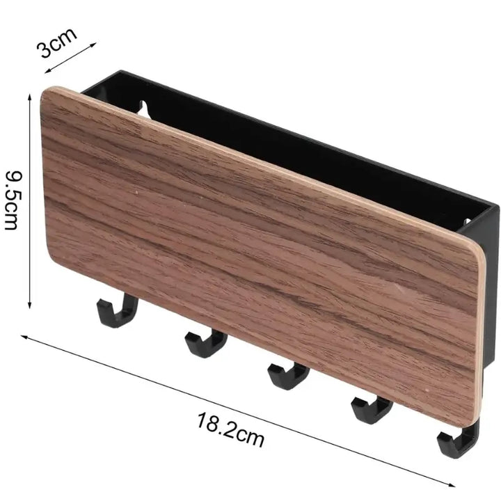 Dimensões do porta chaves Orto: 18,2cm largura x 9,5cm altura x 3cm profundidade com 5 ganchos pretos